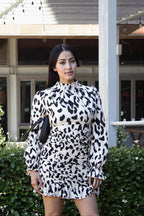 Leopard Print Long Sleeve Ruched Mini Dress – Bold, Chic, & Stylish