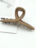Matte Twist Hair Grip – Elegant and Functional Hair Clip