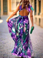 Flowy & Feminine Abstract Print Maxi Dress with a Pleated Skirt