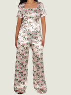 Floral Satin Bloom Jumpsuit – Graceful Power with a Lace-Up Twist